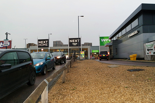Low Angle View of Business Retail Park at Parkway Luton Near Parkway Luton City Airport. The Beautiful Footage Was Captured During a Cloudy and Windy Day of April 12th, 2023