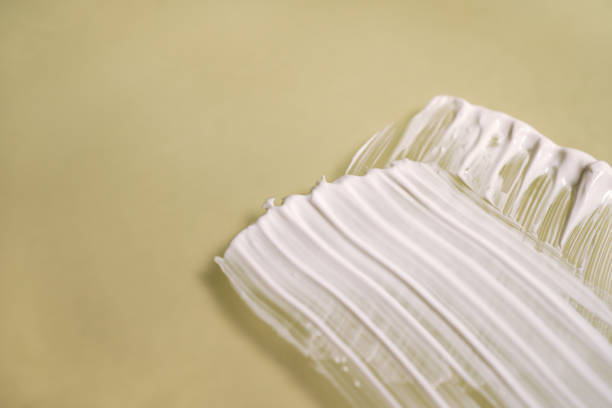 istock A smear of cream on a light background. Beauty concept. 1834431097