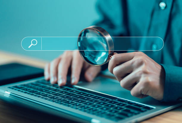 istock Magnifying glass showing search bar 1834435842