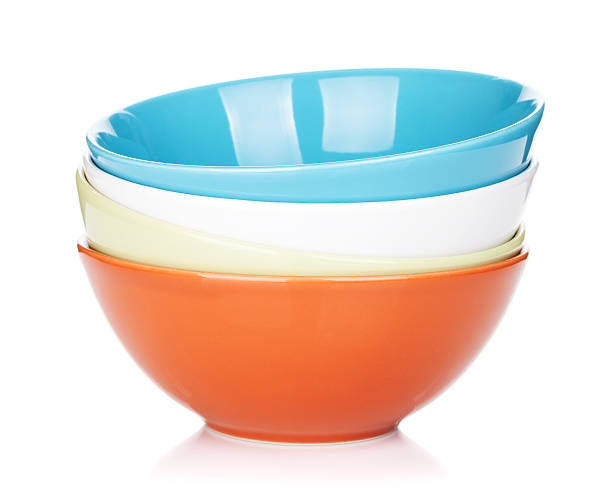 Close-up colorful bowls on white background