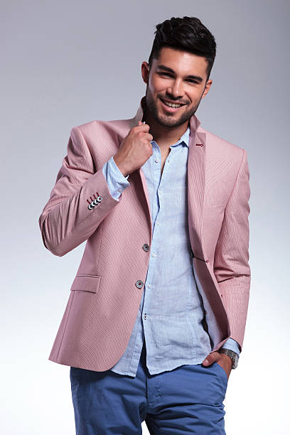 istock casual man raises his lapel 183446967