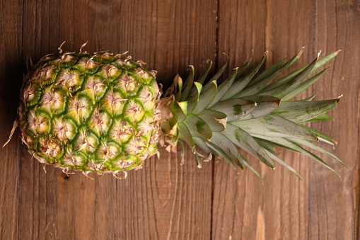 Pineapple is a tropical plant with edible fruit and the most economically important plant in the Bromeliaceae family. Ananas comosus