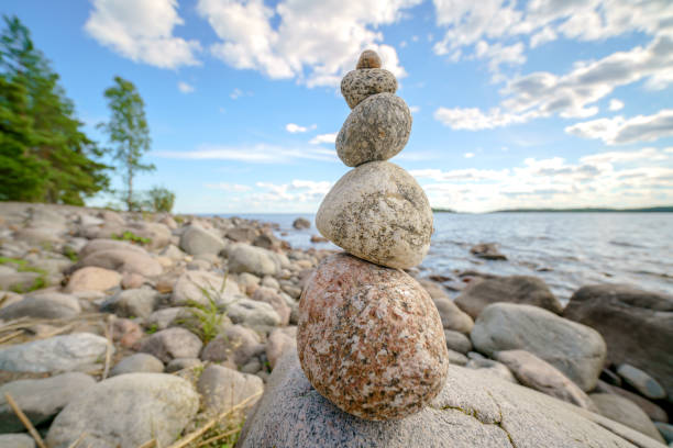 istock Pyramid of stones. Unstable balance of stone objects. 1834479631
