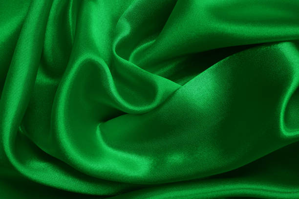 istock Green fabric texture background, detail of silk or linen pattern. 1834480193