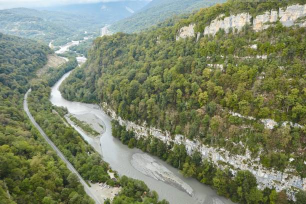 istock A swift mountain river. Water flows in nature. Mountainous terrain. 1834488175