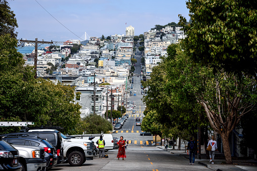 Downhill view of Lombard Street, San Francisco. Lombard Street is an east–west street in San Francisco, California, that is famous for a steep, one-block section with eight hairpin turns.