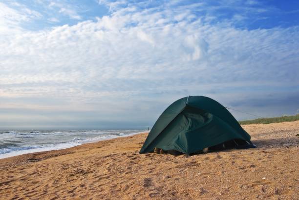 istock touristic tent on a sea coast 1834517849