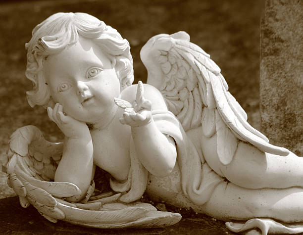 istock little angel with butterfly 183453191