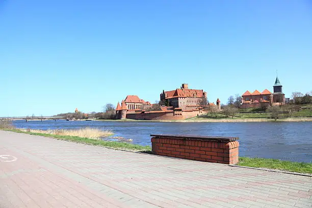 Malbork castle in Pomerania region of Poland. UNESCO World Heritage Site. Teutonic Knights' fortress also known as Marienburg. Nogat river.