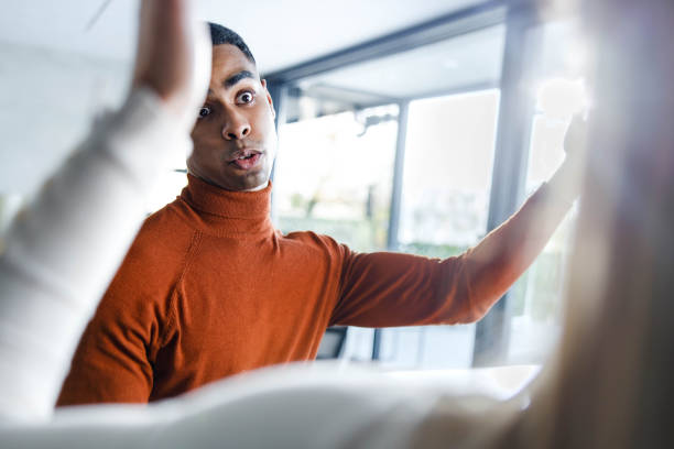 istock African American man arguing with his girlfriend at home. 1834552944