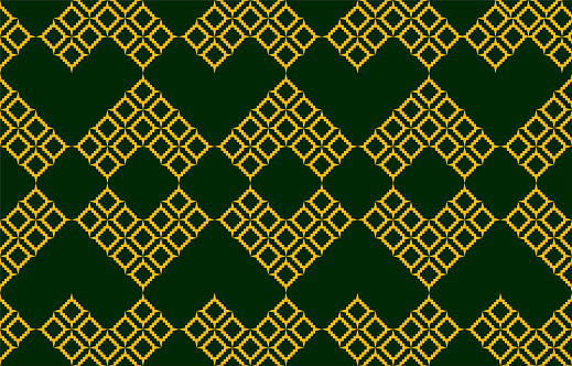 The pattern is heart-shaped and has a square grid on a dark green background