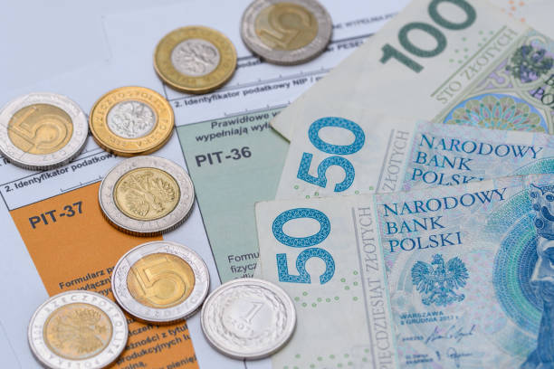 istock Polish tax forms PIT money PLN lie on the desk 1834587593