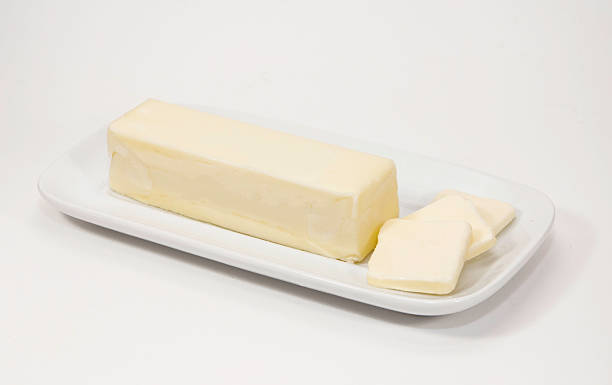 Stick of Butter on a White Dish stock photo