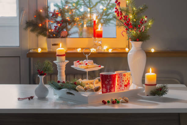 istock christmas decor and red cups with hot drink on kitchen 1834627260