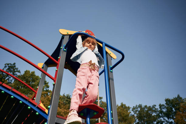 istock Little girl is having fun on the playground 1834631699