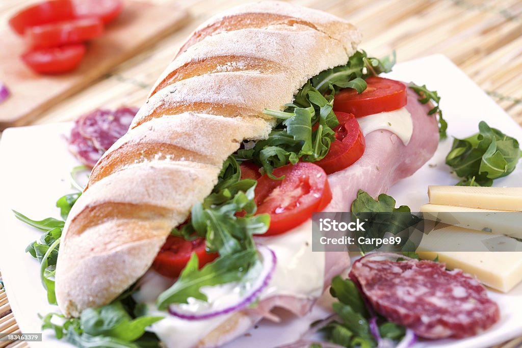 Sandwich with tomato, cheese, and ham American Culture Stock Photo