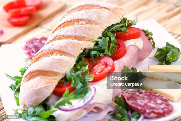 Sandwich With Tomato Cheese And Ham Stock Photo - Download Image Now - American Culture, Baguette, Beef