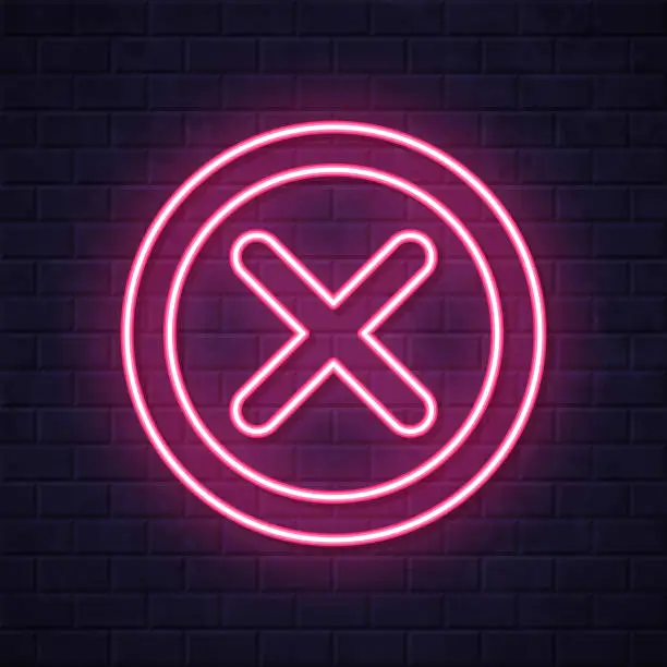 Vector illustration of Cross mark. Glowing neon icon on brick wall background