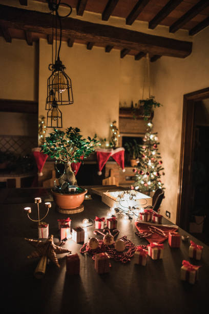 istock christmas candle on the table 1834680828