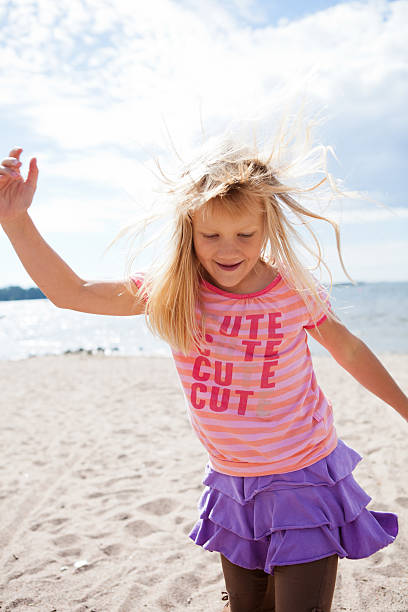 istock Young girl at beach 183468935