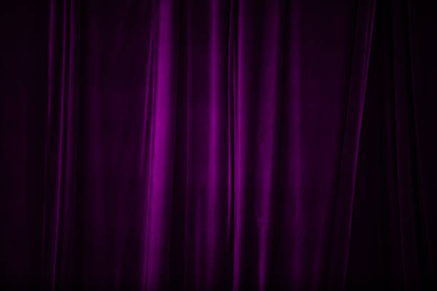 istock violet curtain in theatre. 1834694102