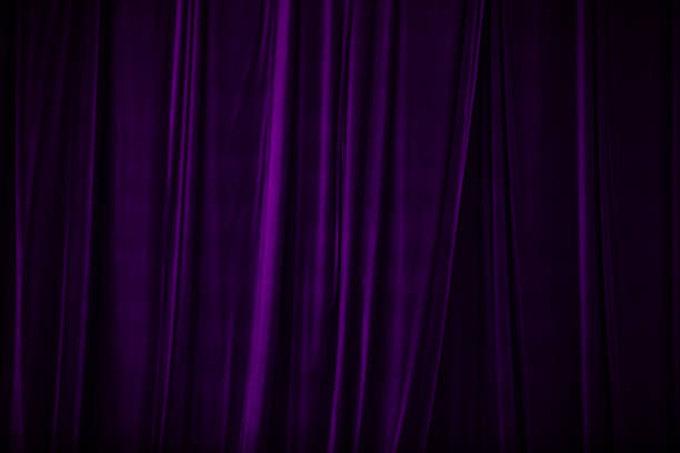istock violet curtain in theatre. 1834694106