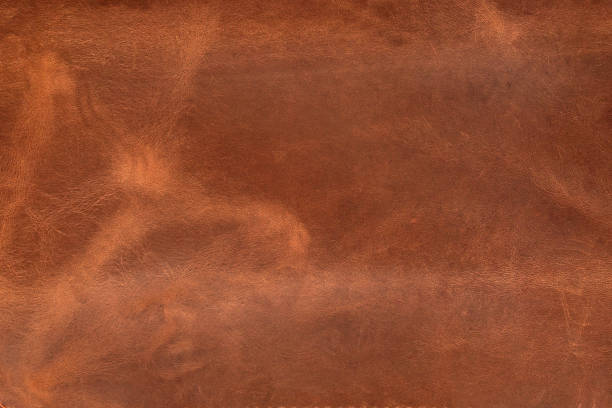 istock Surface is made of genuine brown leather. Abstract background. 1834711468