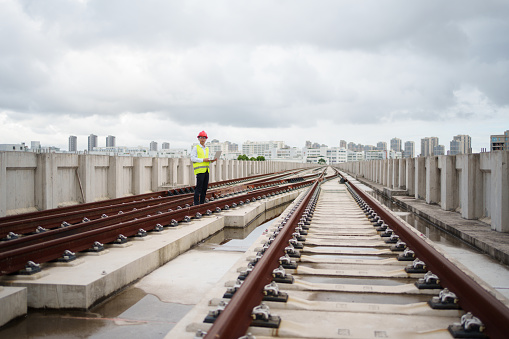Engineer inspecting railway