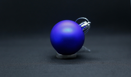 a Blue ball for christmas tree on Black background