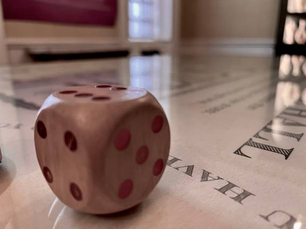 istock Close up of a dice on a table 1834724335