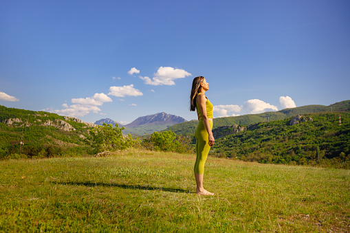 Amidst the beauty of nature, a yoga guide finds balance and peace in her yoga practice.