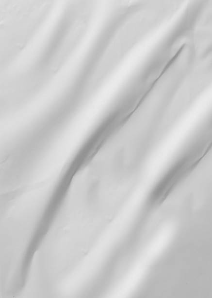istock Background texture of crumpled gray vertical paper 1834740601