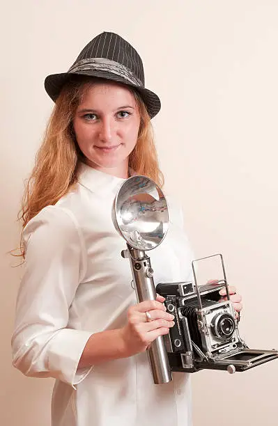 Photo of Young Newspaper Woman