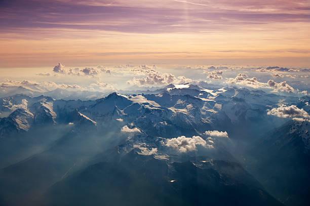 istock High altitude view of sunset over the mountains. 183479496