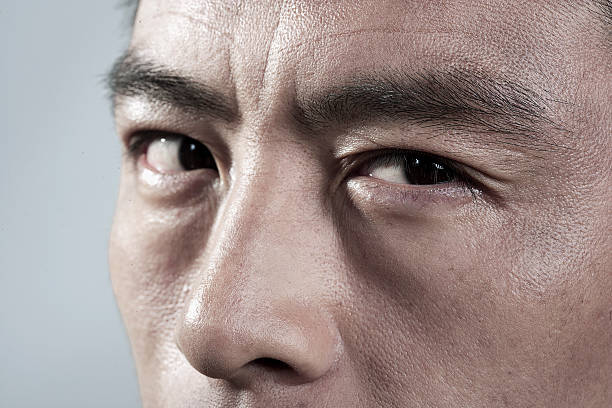 istock Extreme Close up on angry mans face 183479829