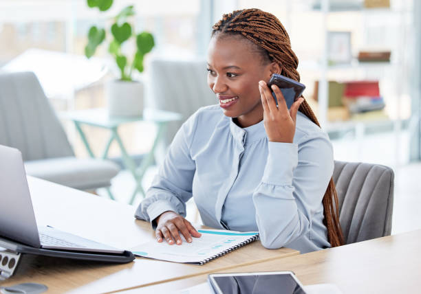 istock Black woman, speaker phone call and laptop with thinking, reading and networking with accounting advice. African financial advisor, person and smartphone for contact, happy and computer with vision 1834820312