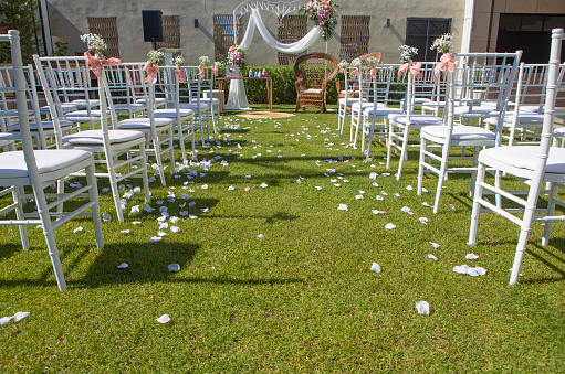 Wedding arrangement site view. Sunny garden background