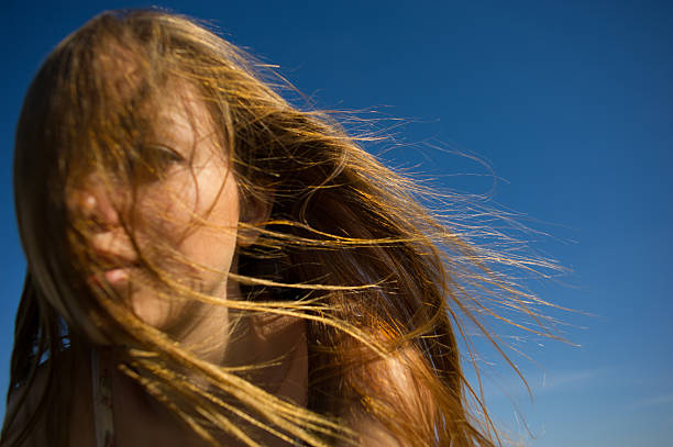 istock woman face  a flowing hair 183486166