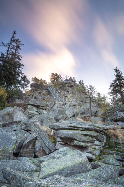 istock Scenic view of a mountain trail, with large rocks and trees 1834885501