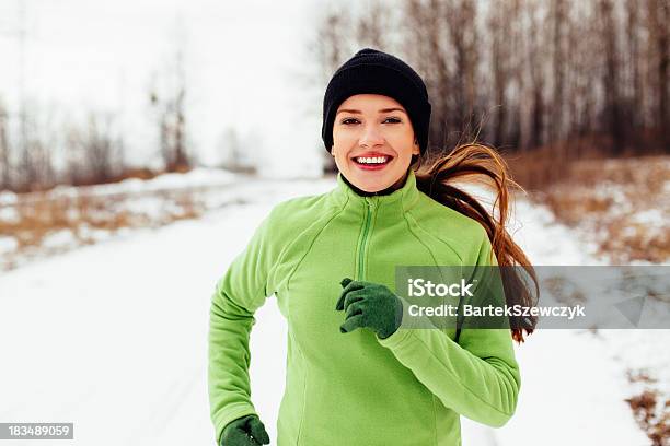 Running In Winter Stock Photo - Download Image Now - Winter, Running, Exercising