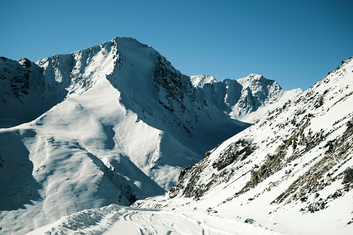 Saddle of mountain pass in winter. Chon-Ashuu mountain pass, 3800 meters