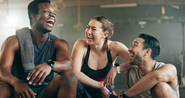 istock Fitness, group and laughing in gym with confidence, workout and exercise class. Diversity, friends and wellness portrait of funny athlete with community ready for training and sport at a health club 1834929444