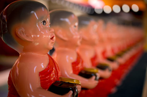 istock selective focus of young monk dolls in thailand temple 1834931123