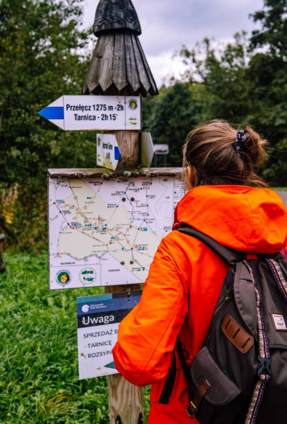 Hiking holiday vacation. Backpacking surrounded by beautiful green scenery of hills and mountains