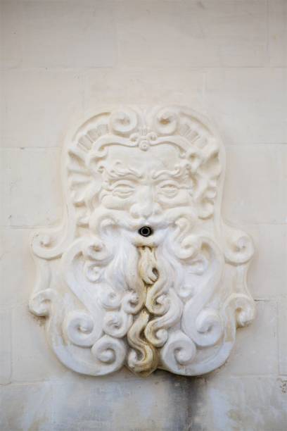 istock Ancient fountain of white marble 1834951535