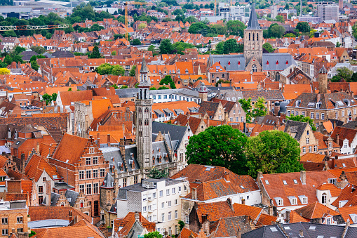 Brugge/Belgium-Oct 28 2019:Bellfry and City Hall at Market Square in Bruges, the capital of West Flanders in northwest Belgium, Traditional Colorful Brick Buildings in Market Square