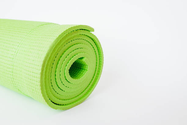 istock Yoga mat green color on white background, includes clipping path.Copy space 1834964340