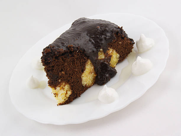 istock Slice of chocolate cake on the white plate 183499764
