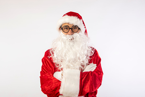 Santa Claus with round glasses on a light colored or white background