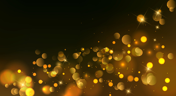 Abstract gold christmas bokeh lights and shiny sparkling background design